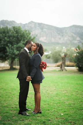 Couple holding hands in a park