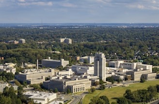 Aerial view of a large university campus with modern buildings.