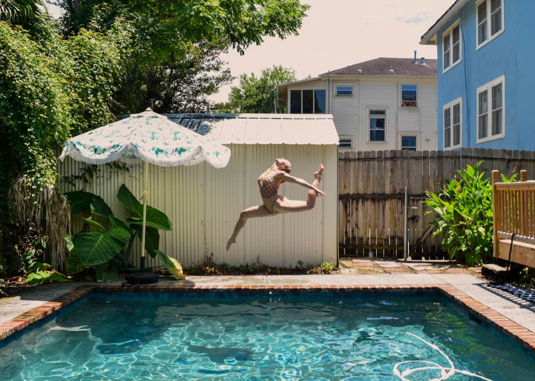 children jumping into backyard pool - above ground pool jumping platform children jumping into backyard pool - above ground pool jumping platform