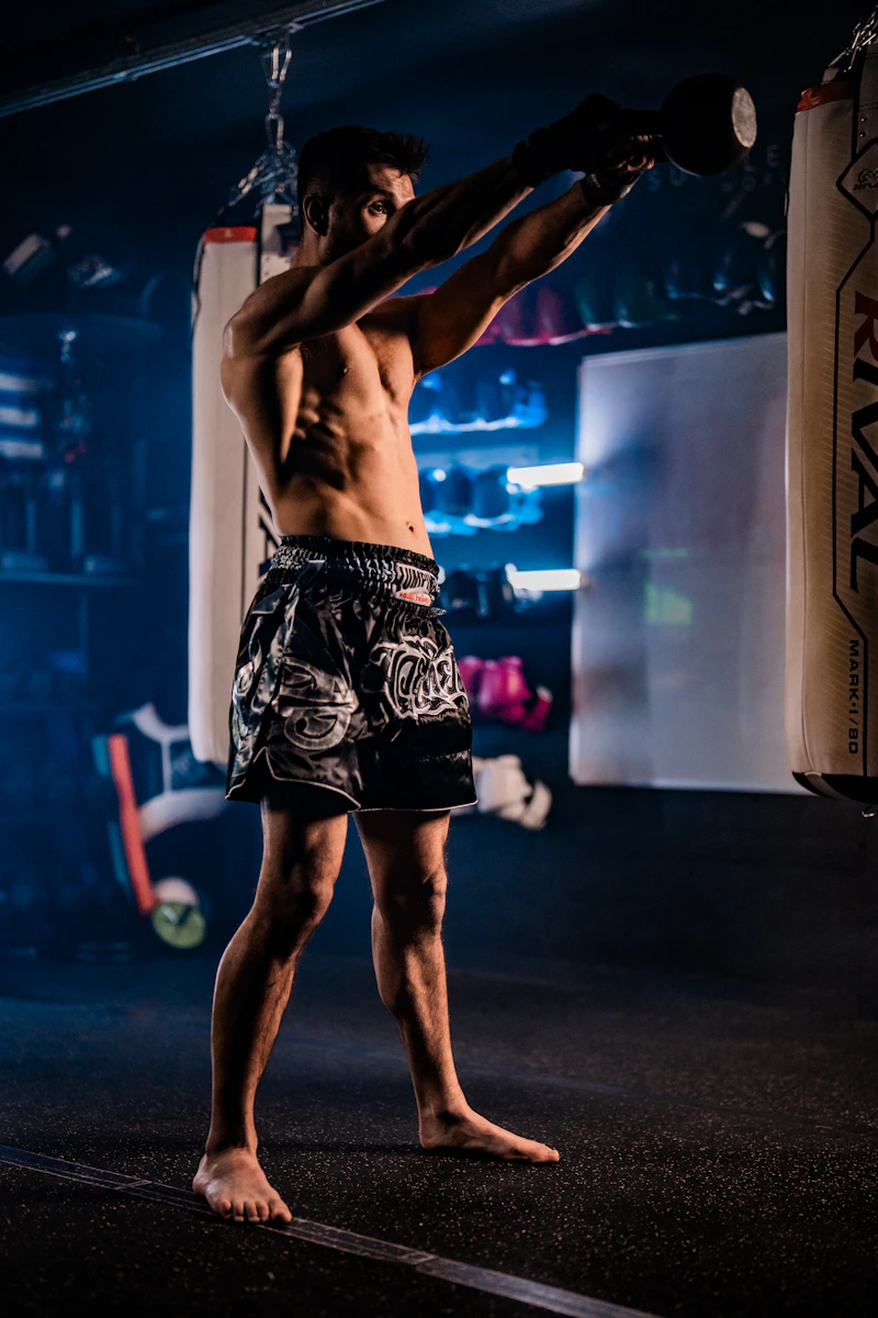 Man performing a kettlebell swing