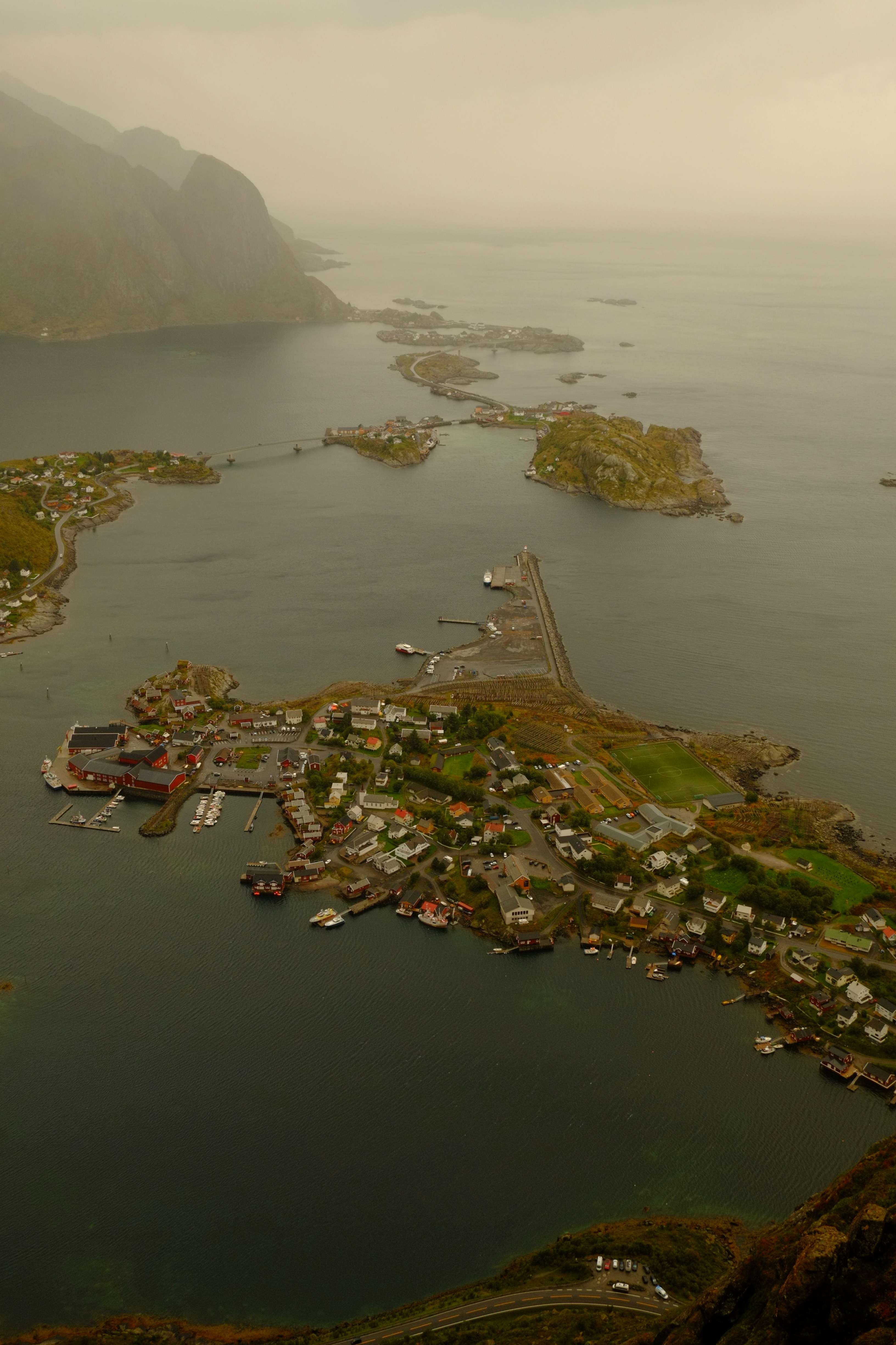 Coastal village nestled among islands and mountains