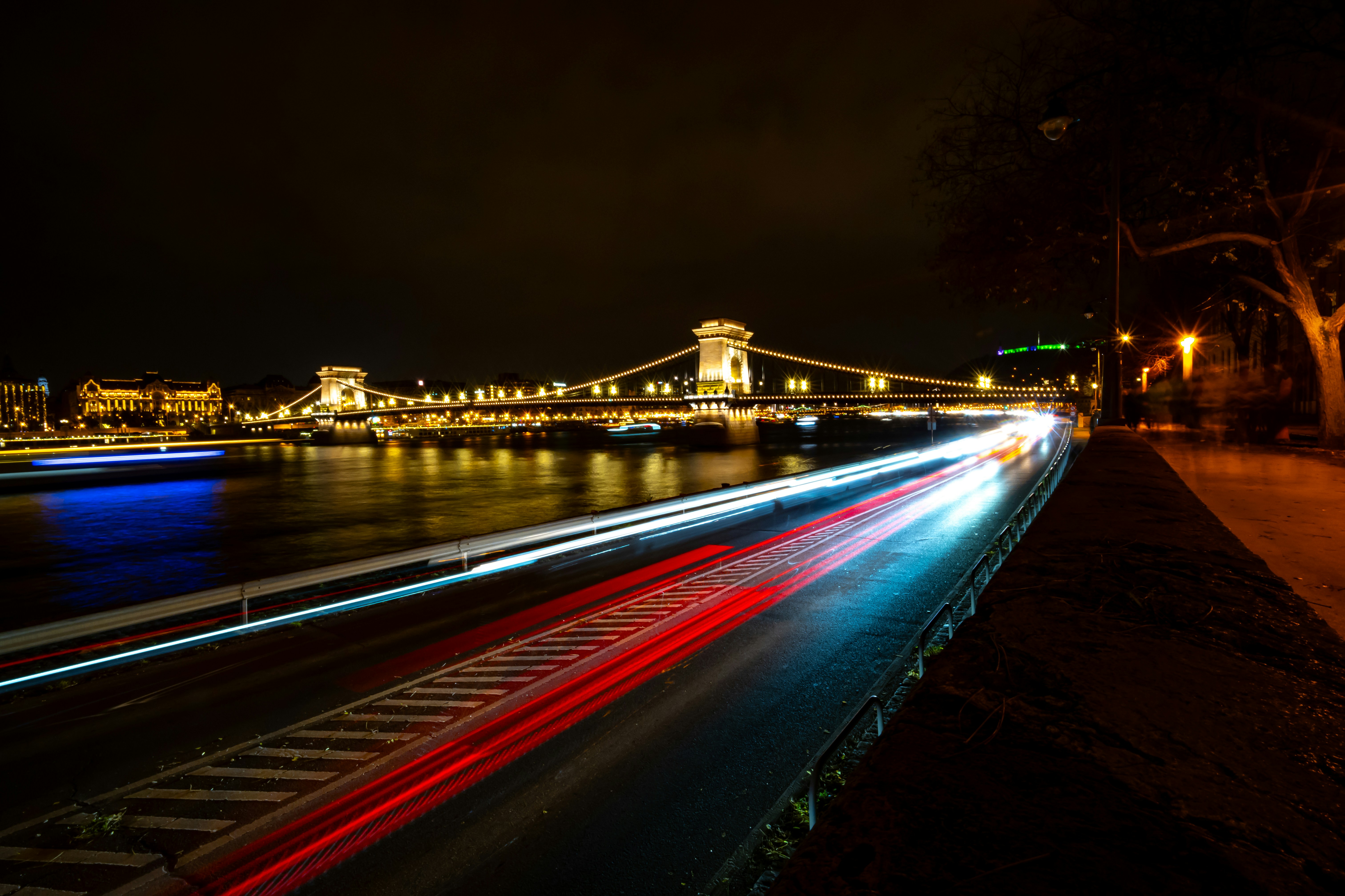 Light trails from cars on a bridge at night