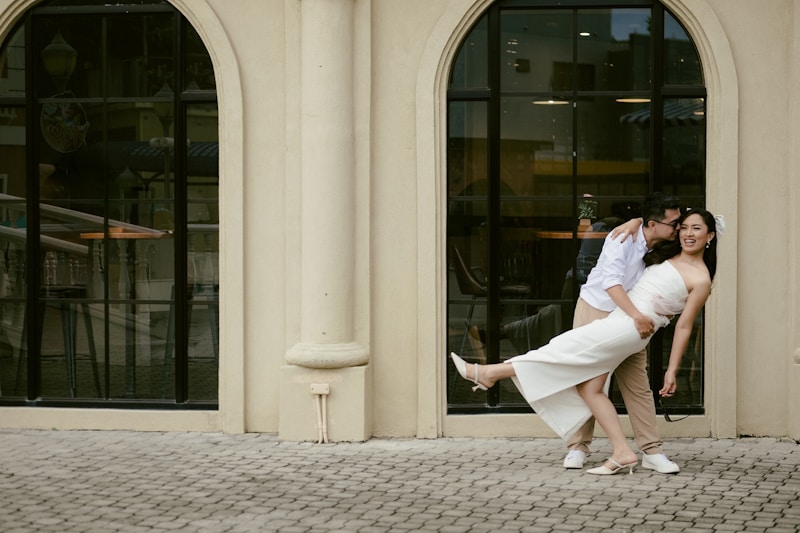 couple dancing playfully in elegant venue