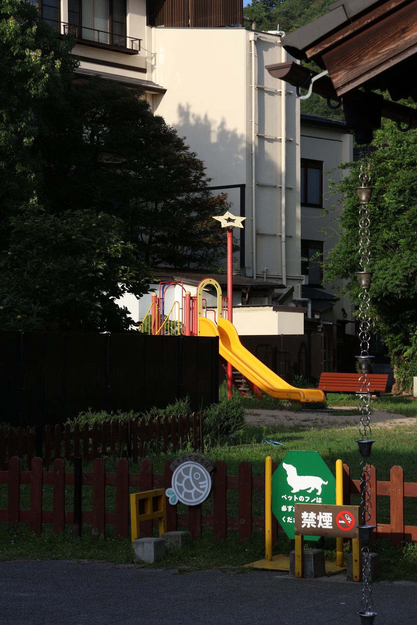 Playground equipment on a surfaced play area