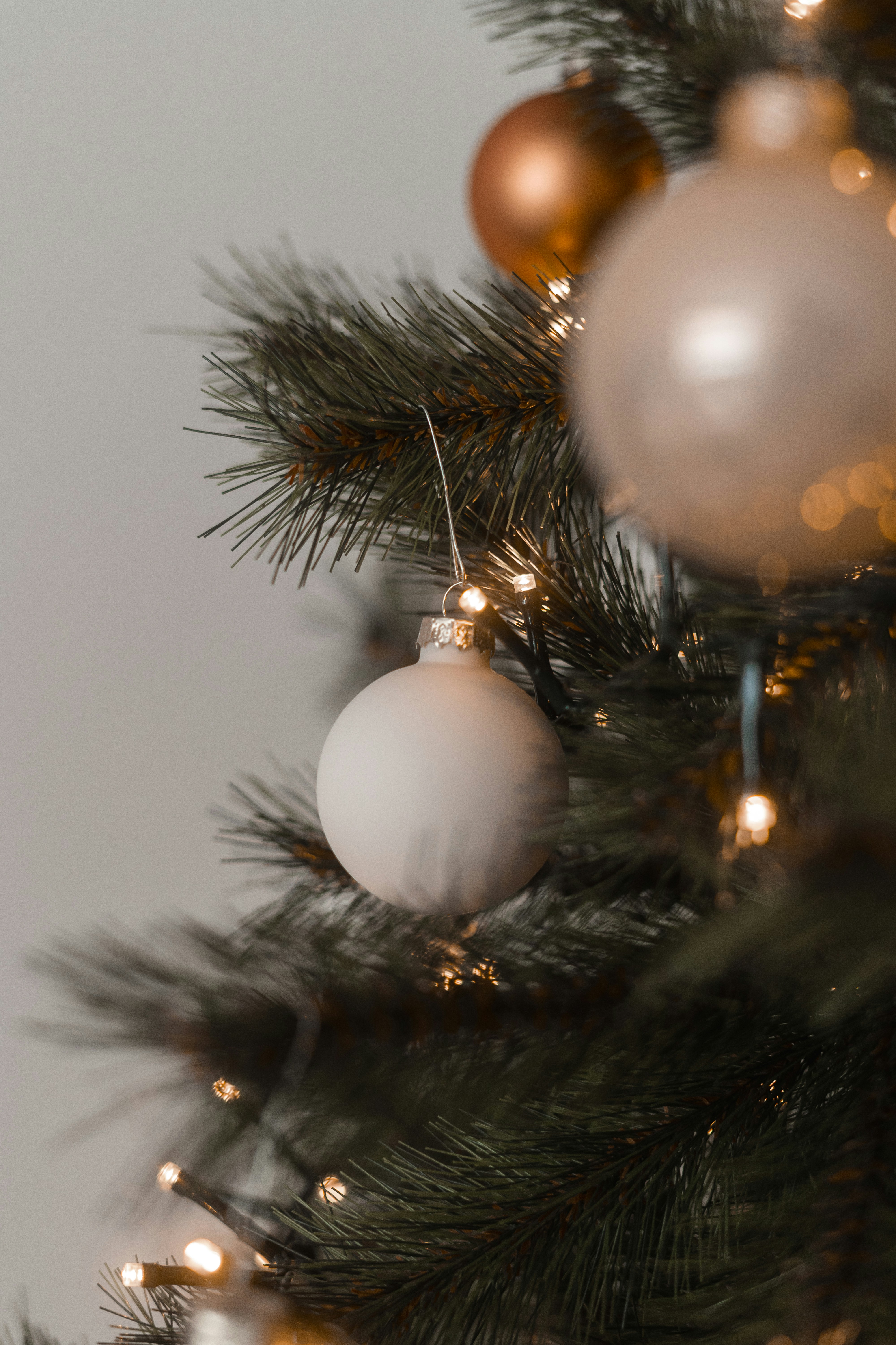 Close-up of a decorated christmas tree with ornaments.