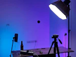 Studio setup with lights, camera, and table.