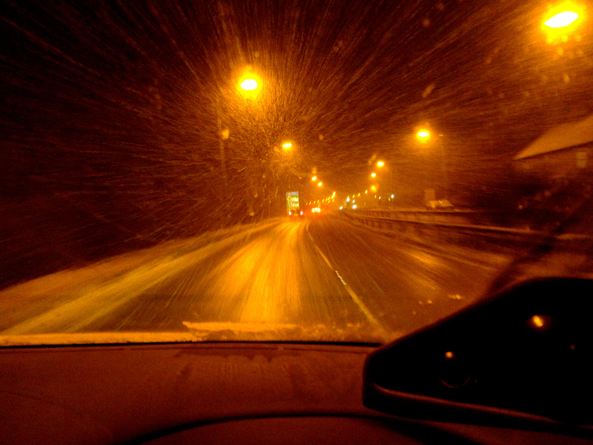 Road at night under orange street lights