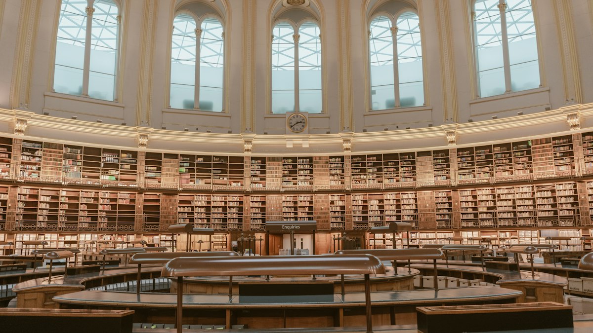 A domed reading room lined with archive shelving
