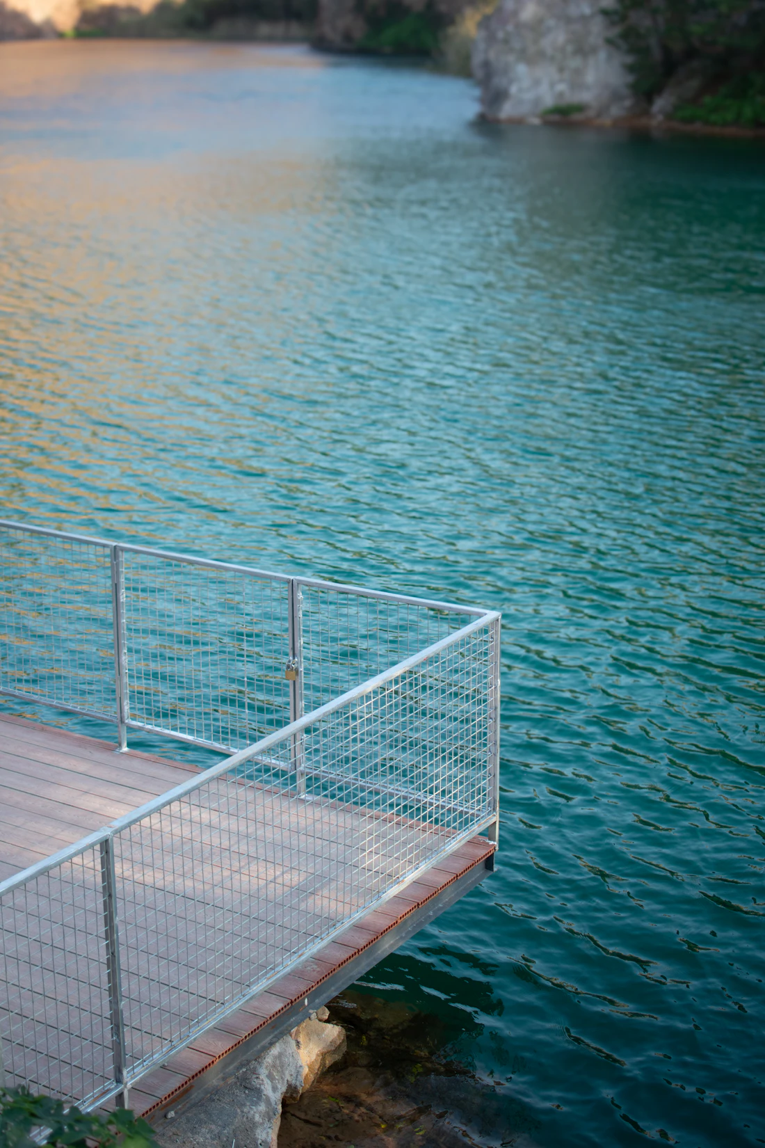 Aluminum railing on a deck overlooking Okanagan lake water