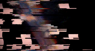 Abstract digital glitch art with black background.