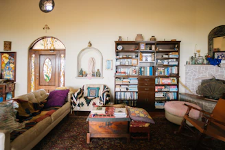 Cozy living room with eclectic decor and bookshelves