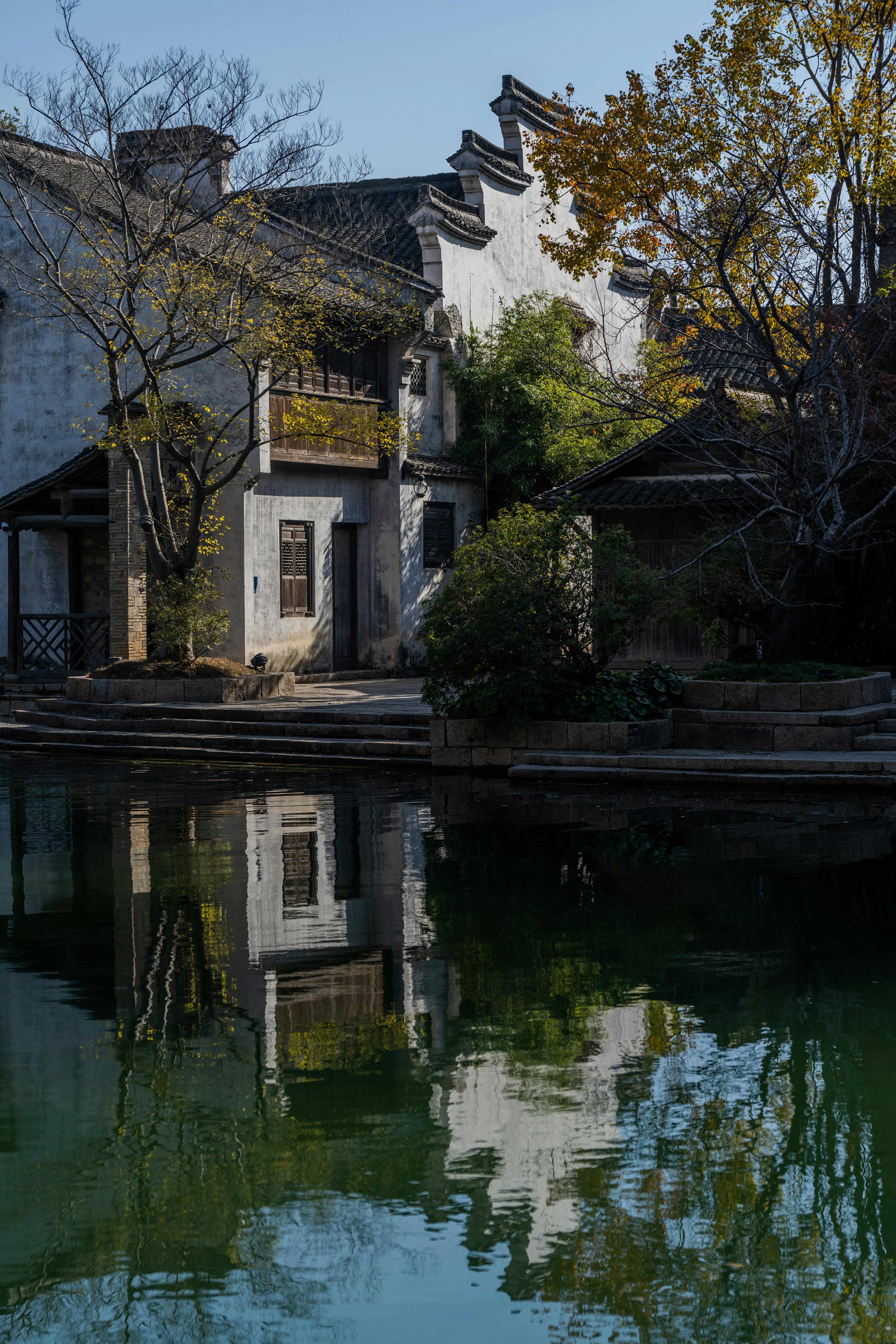 Traditional chinese buildings reflected in water