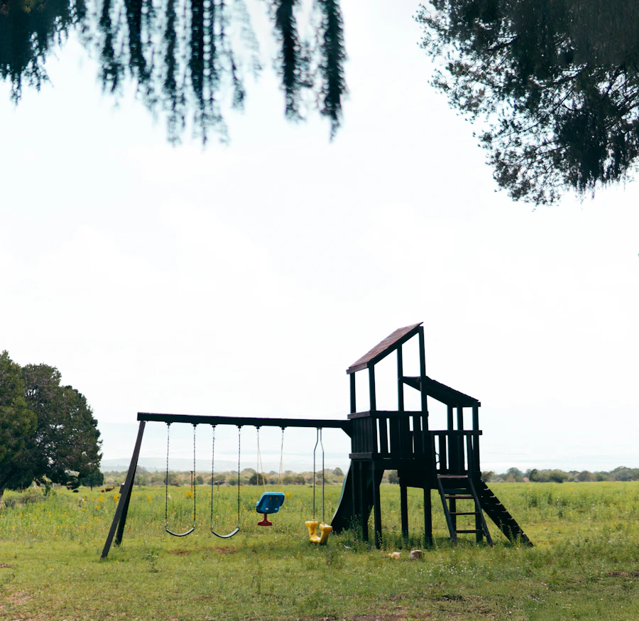 Timber play structure in a spacious outdoor setting