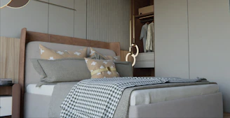 Modern bedroom with a neatly made bed and open closet