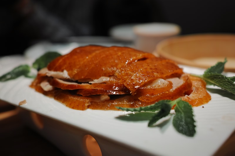 Crispy Peking duck with mint leaves