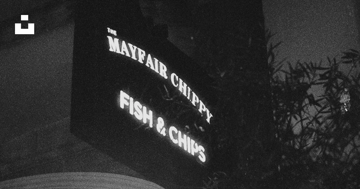 Mayfair Rioco Sign Mayfair chippy fish and chips sign at night. photo – Free Window Image ...
