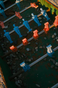 Close-up of a vintage foosball table with players.