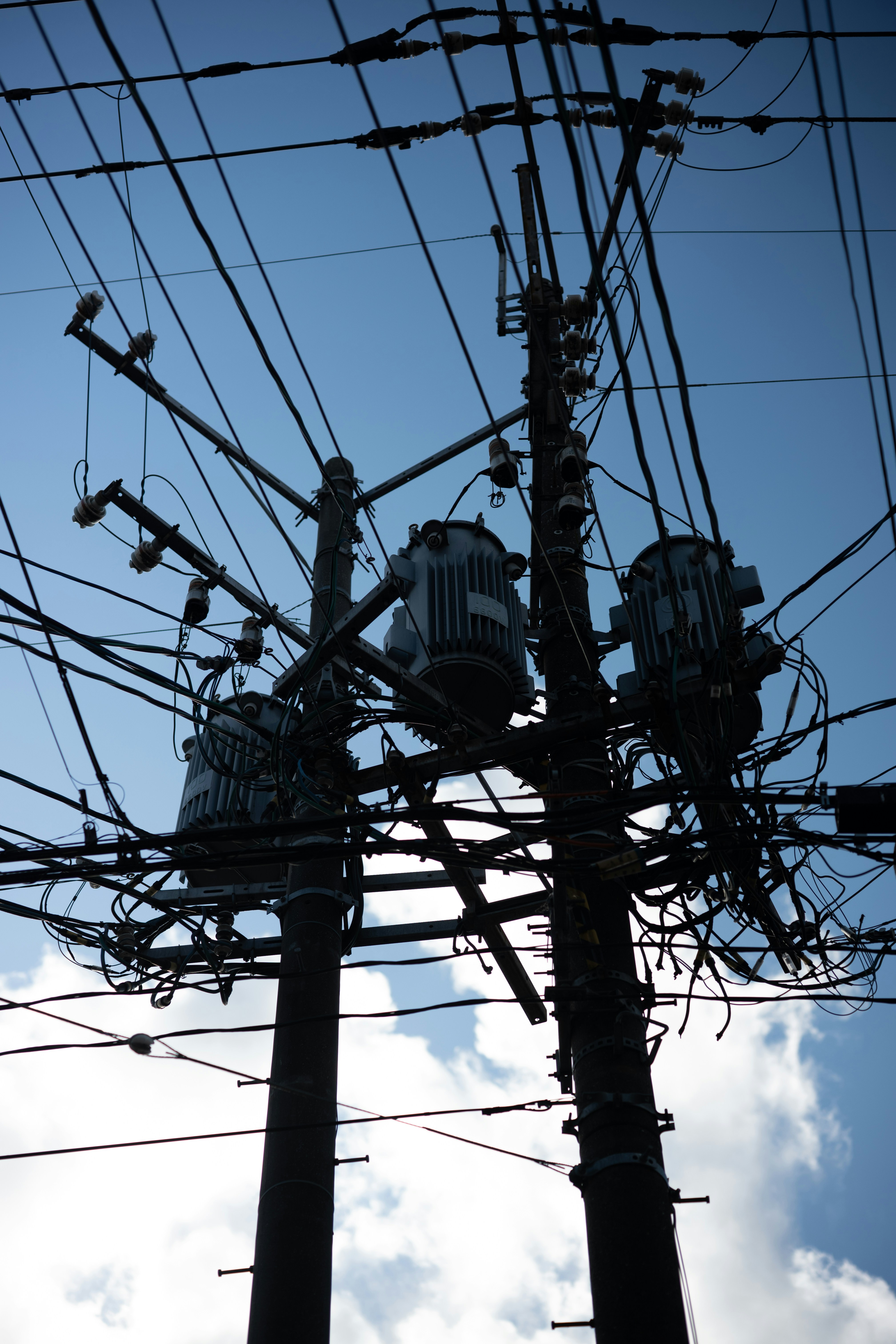 Diagram of power transformer components within an electrical grid