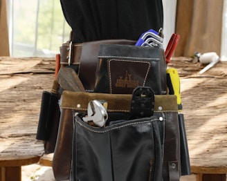 Tool belt filled with various hand tools