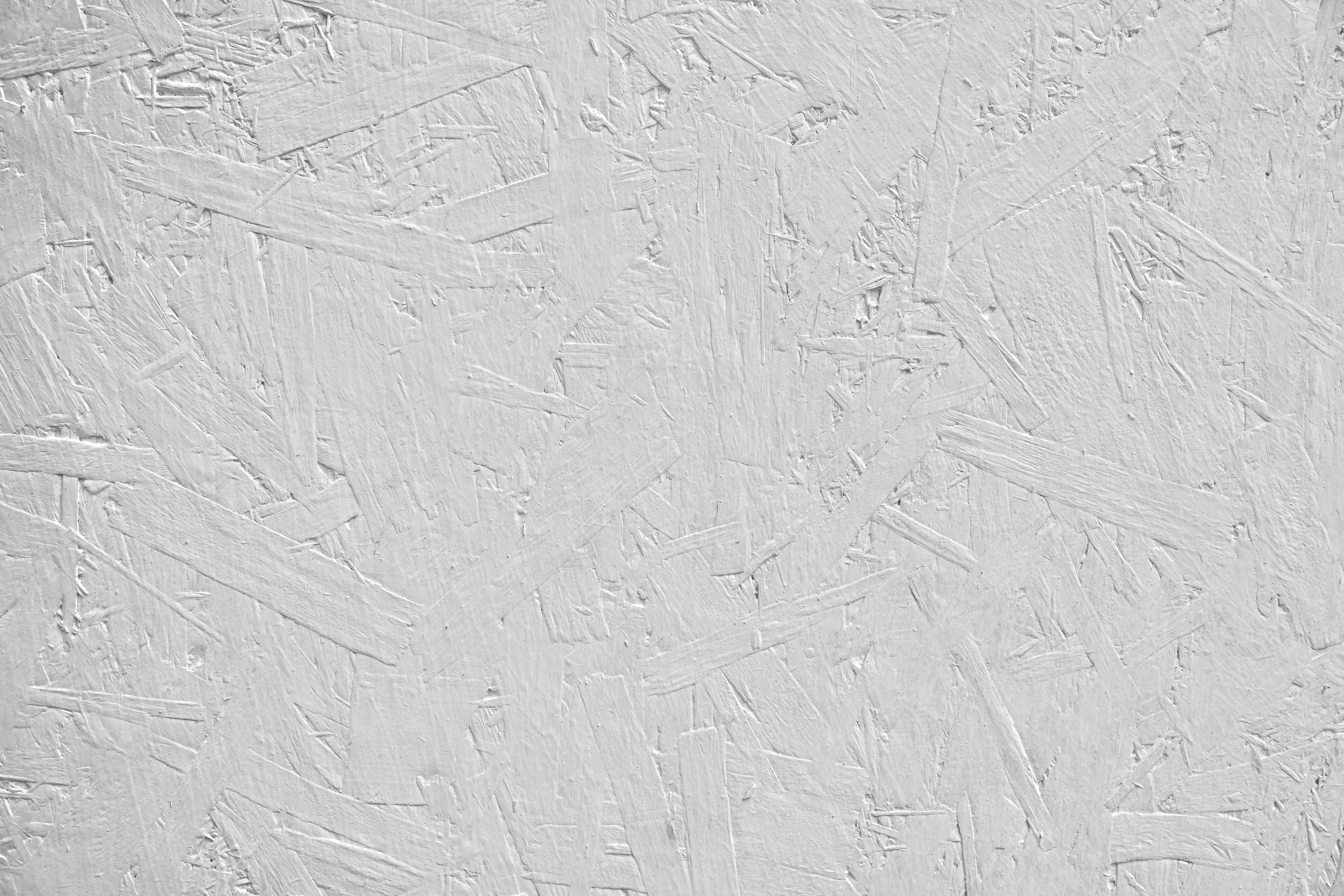 Rough textured white painted wood surface