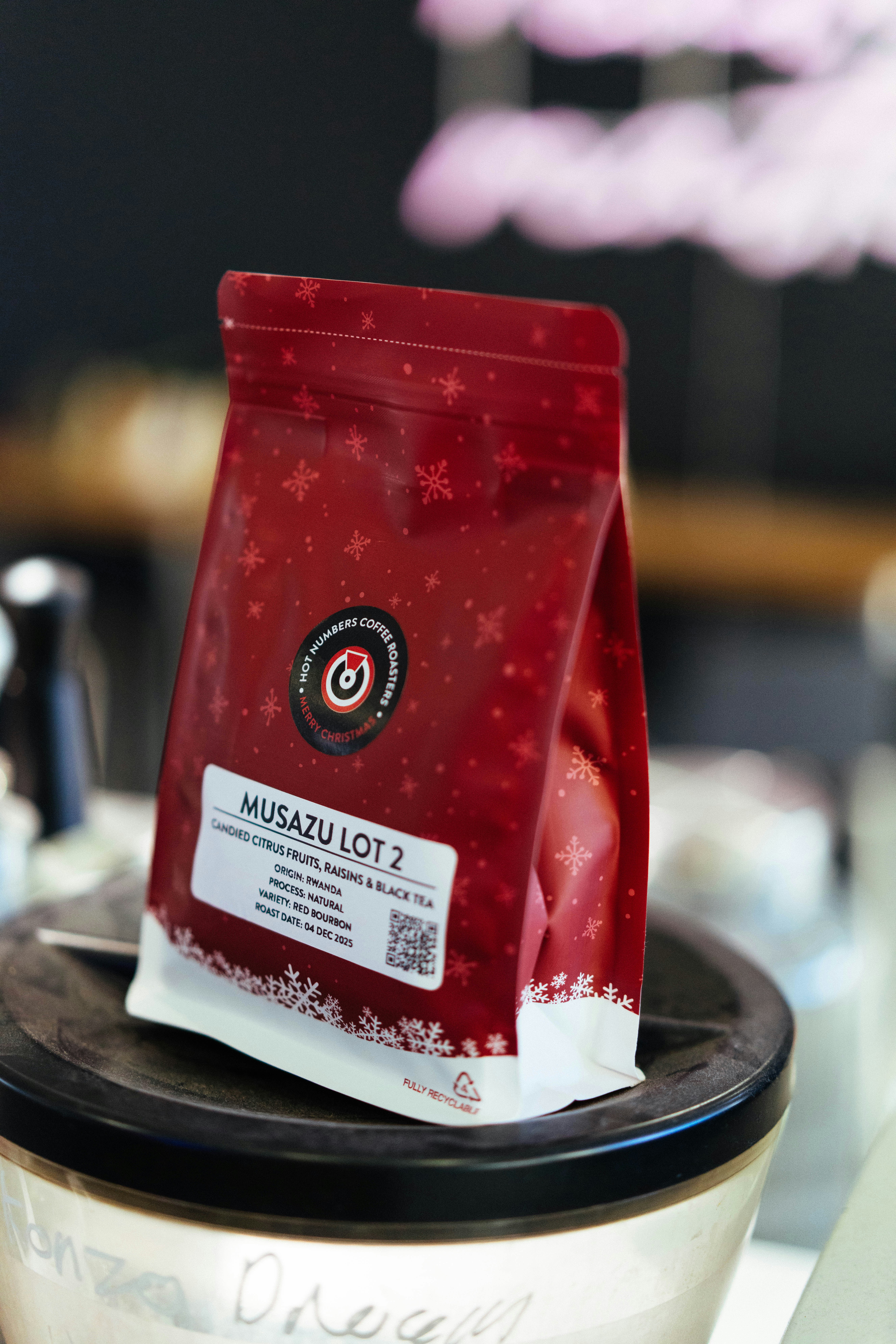 Red bag of musazu lot 2 coffee beans.