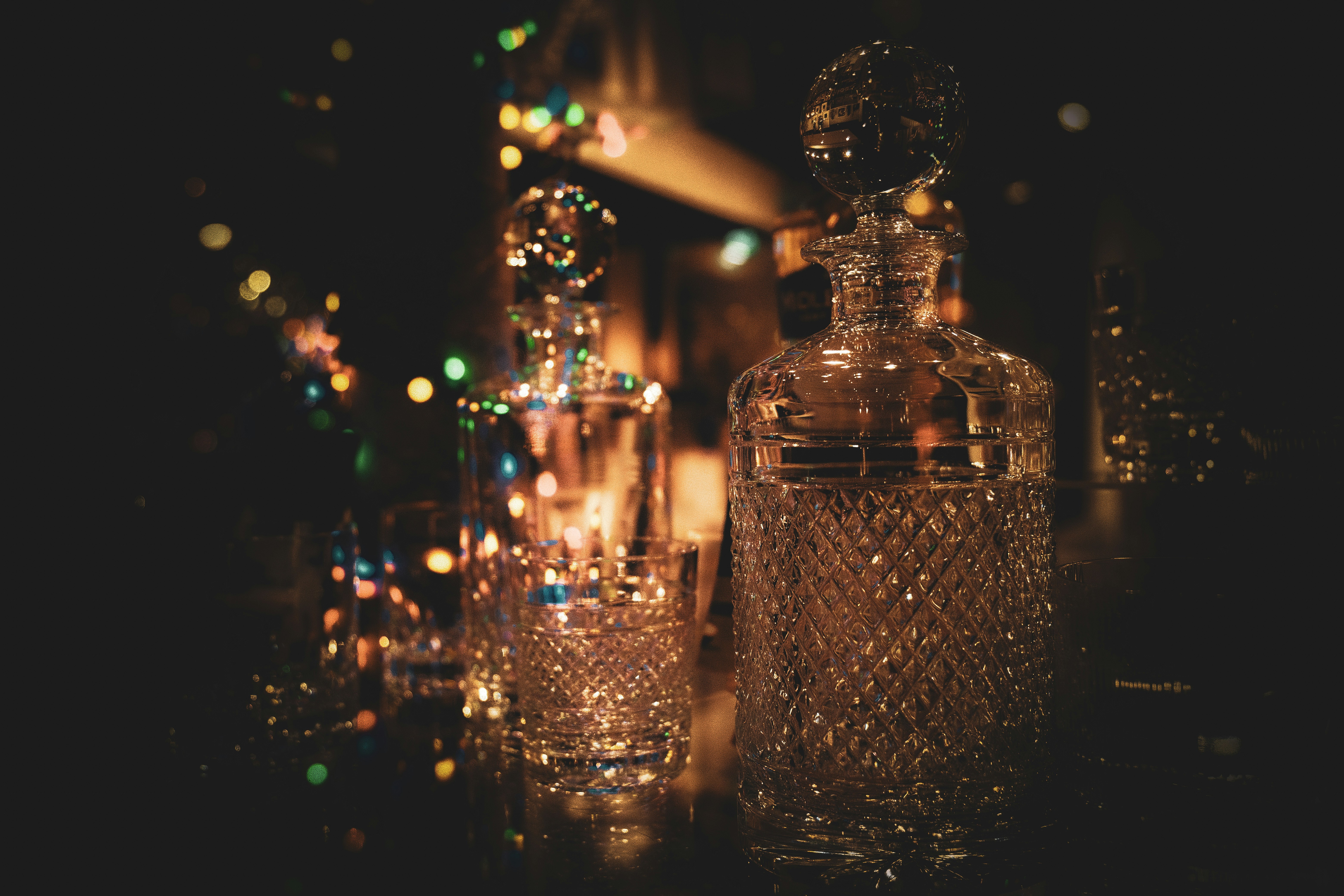 celebratory drinks party bokeh, ilustrasi artikel Open Bar: Toasting the Pros and Cons of a Freely Flowing Event 8