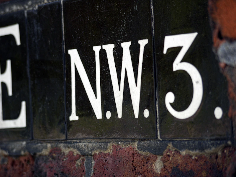 NW.3 postcode street sign in London