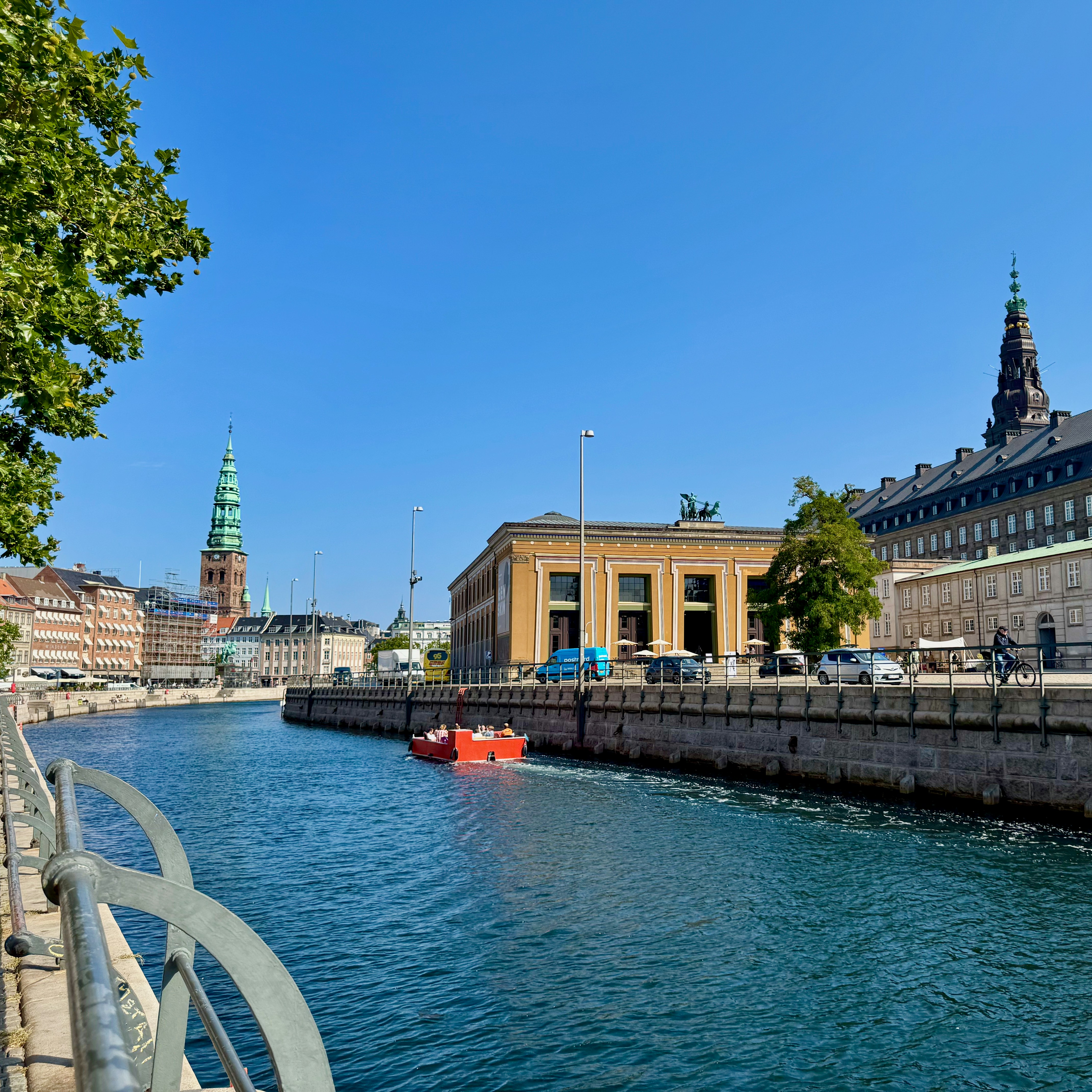 Canal with boats and buildings on a sunny day