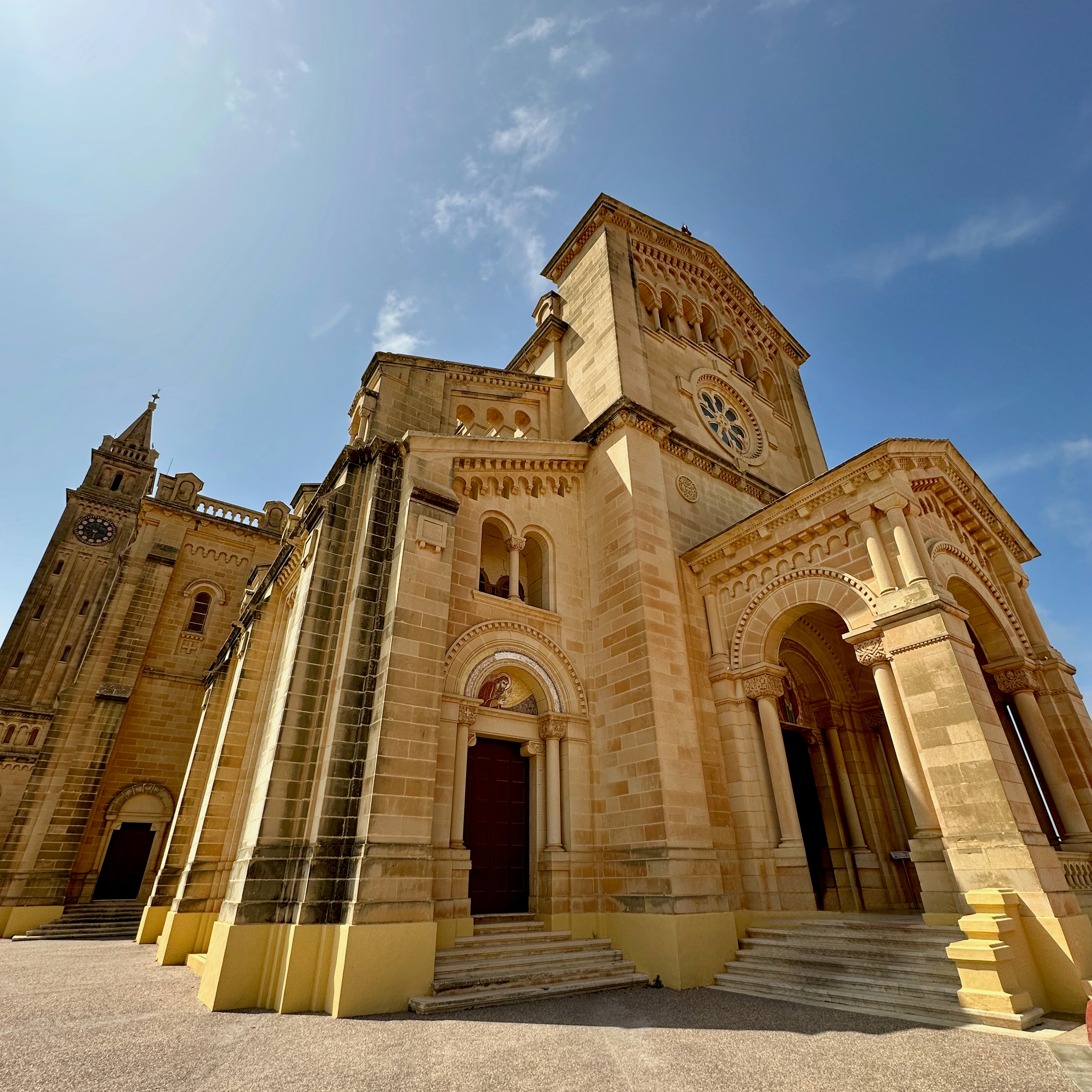 A grand stone church with ornate architectural details.