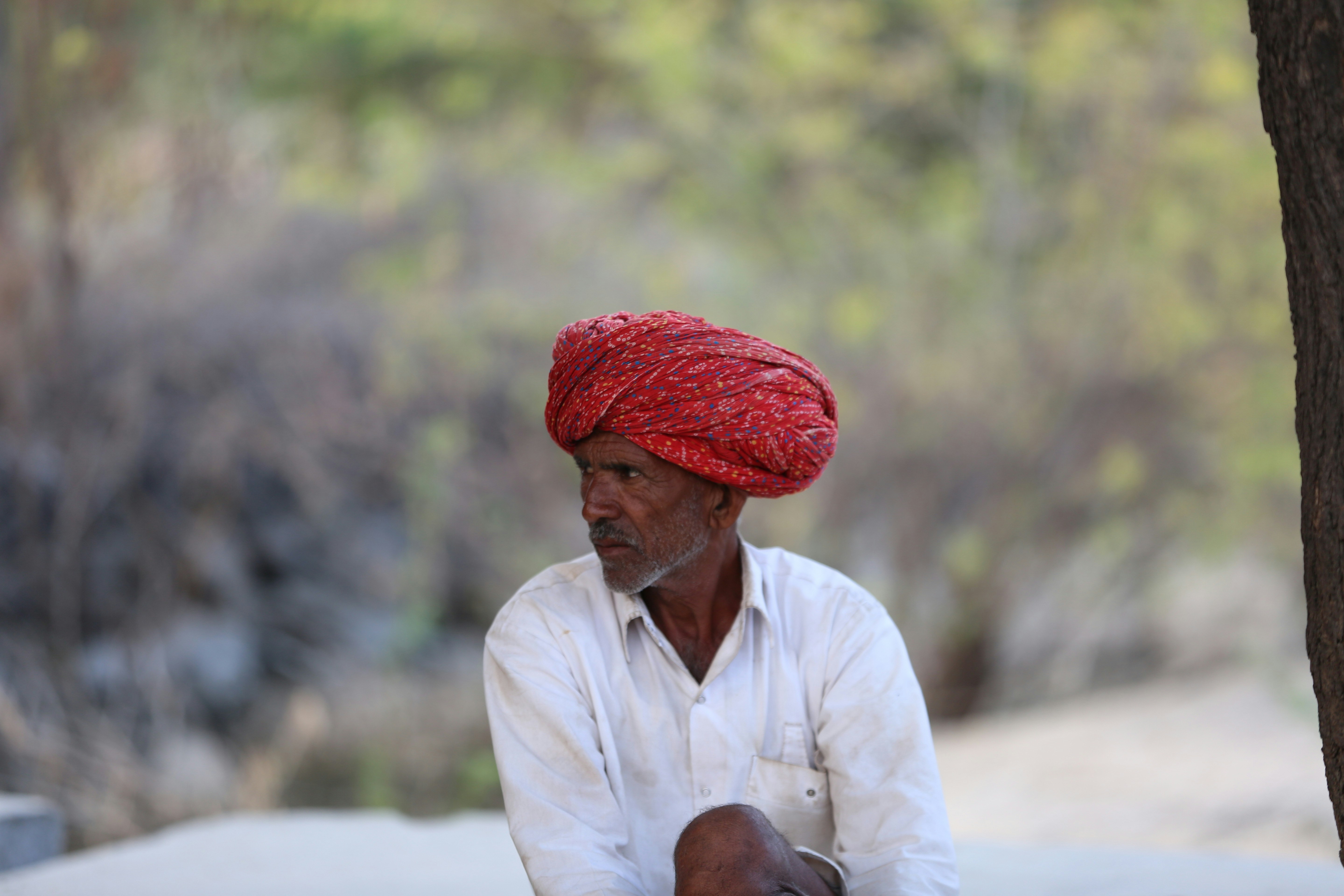 A woman receiving an Indian head massage in a spa.