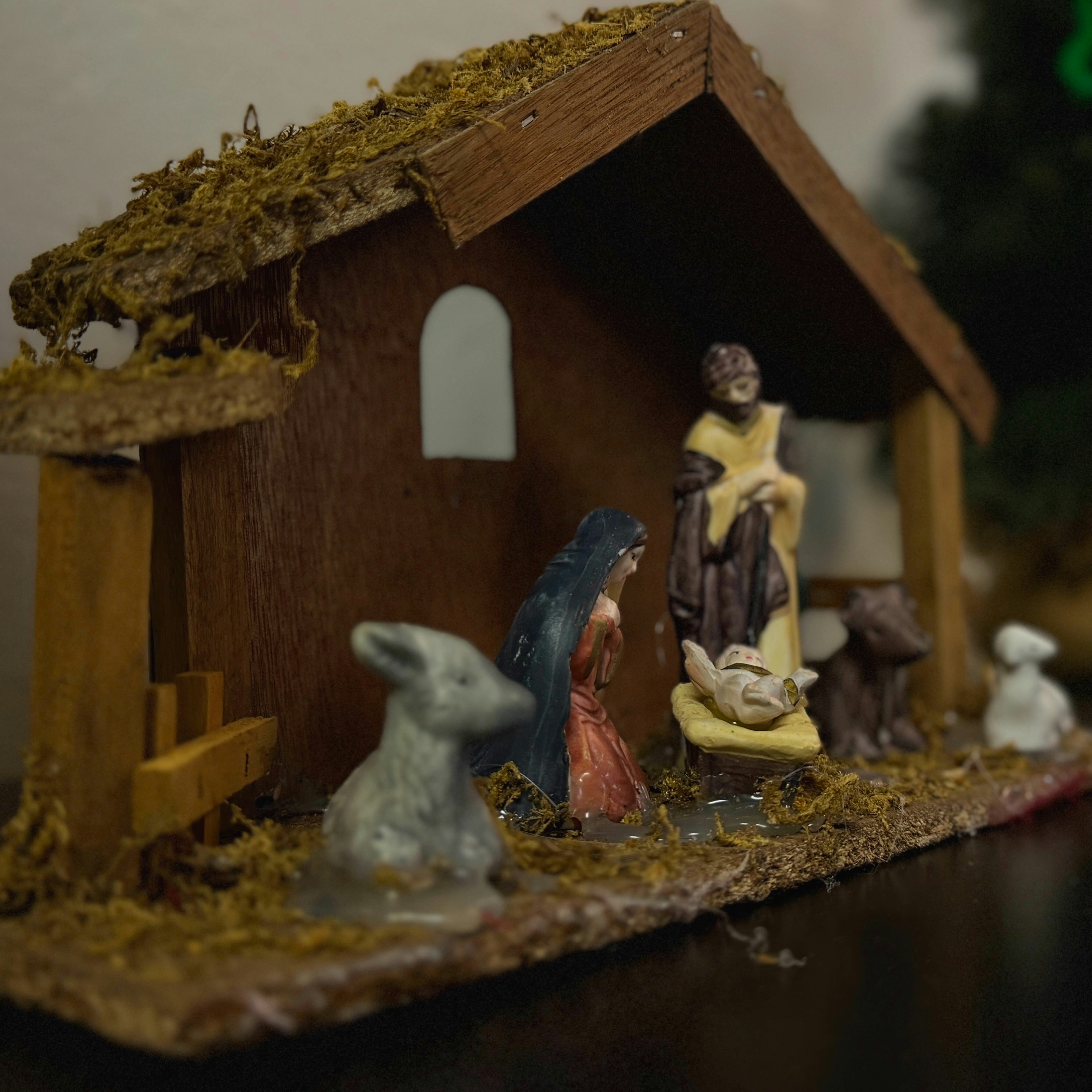 A nativity scene with figures and animals.