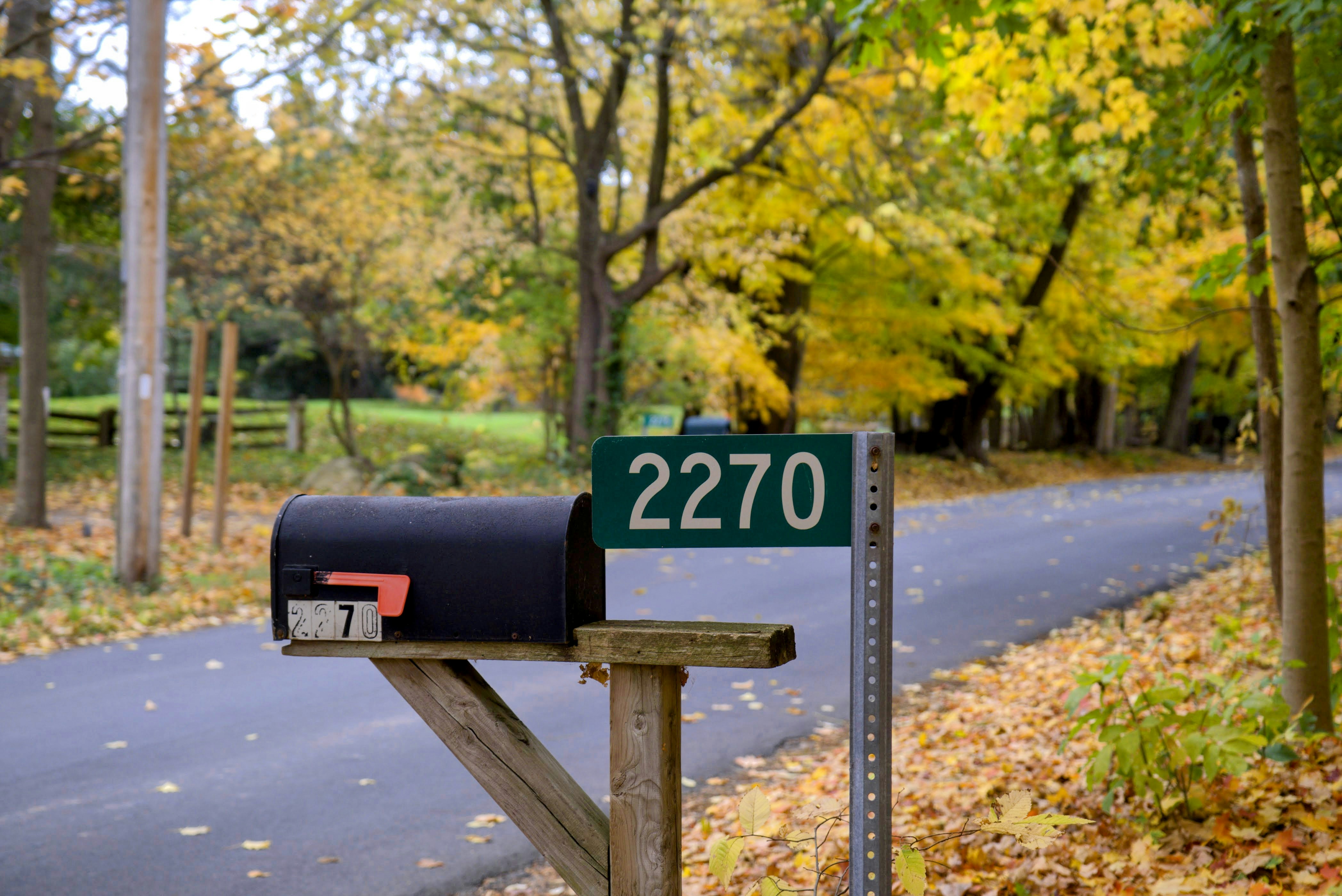 Black mailbox with address 2270 on rural road