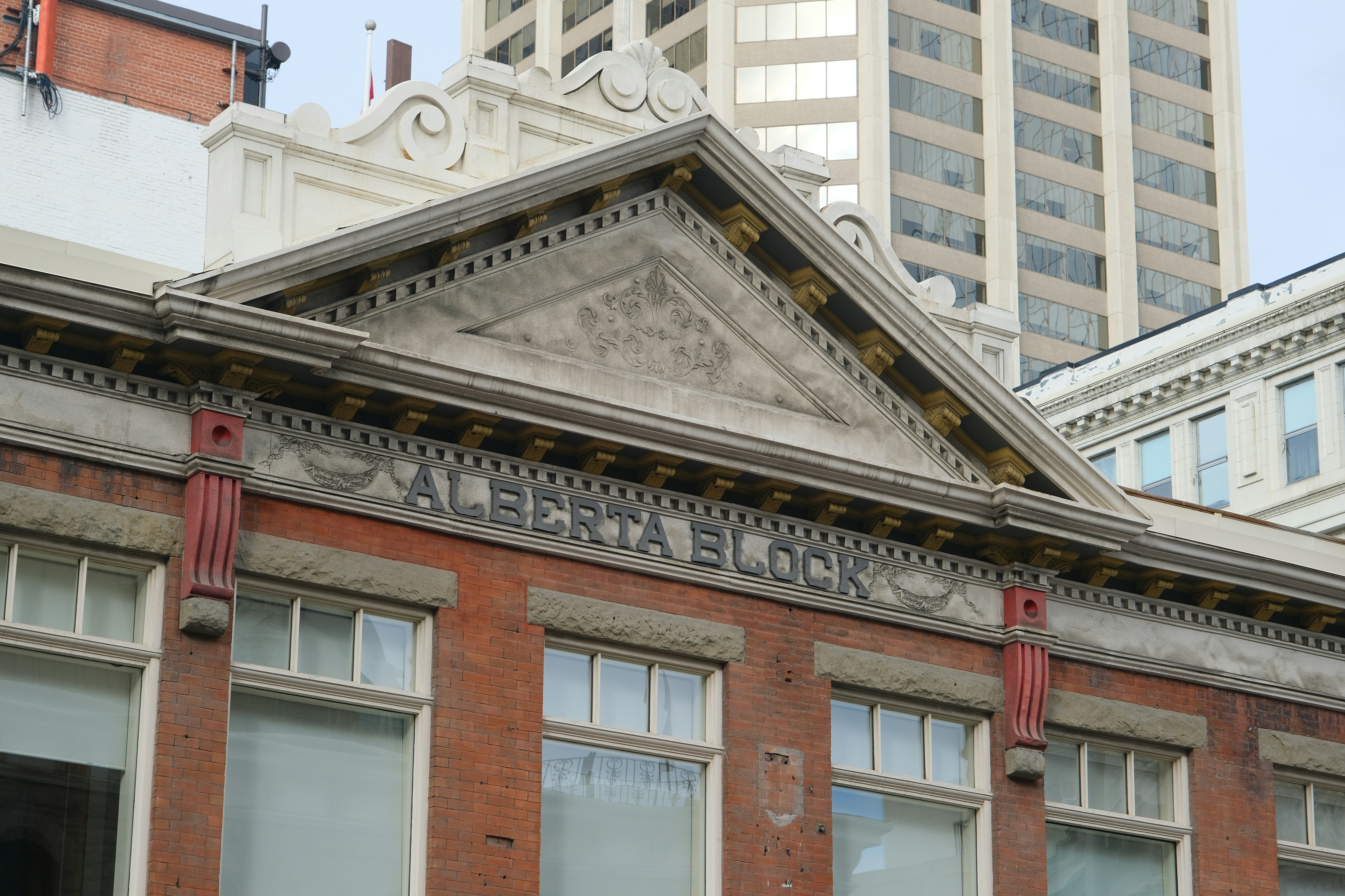 Historic alberta block building facade with ornate details.