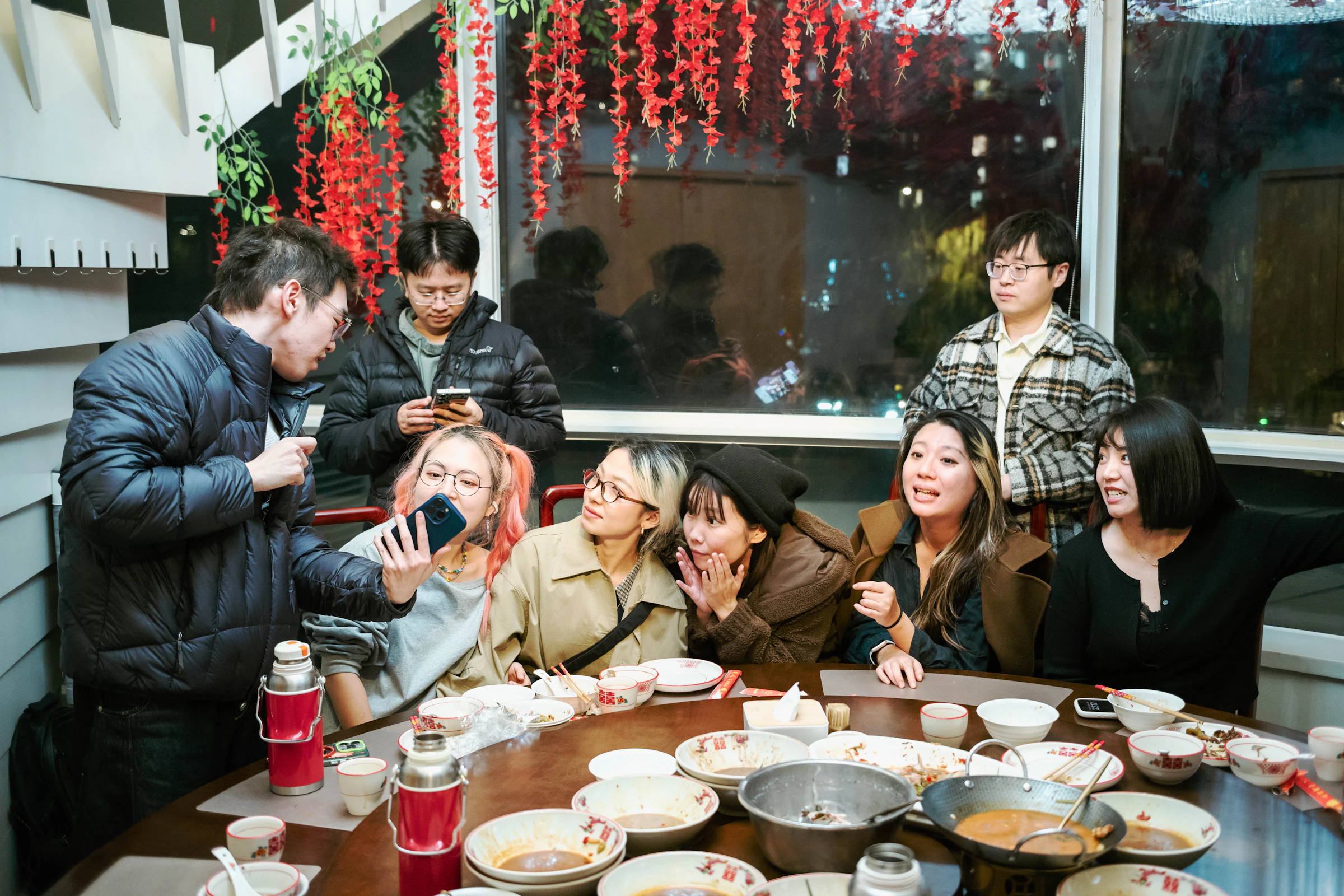 Friends gathered around a table for a shared meal