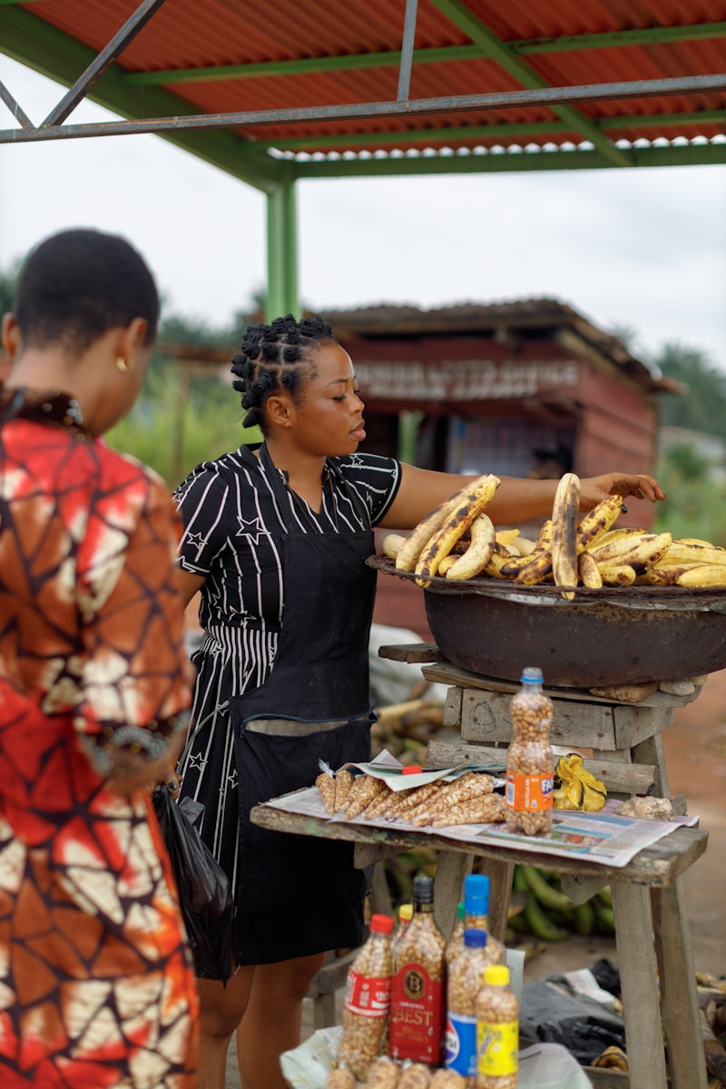 Fried green plantains being prepared the traditional way