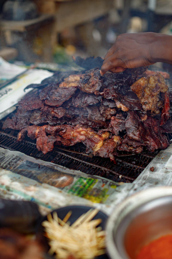 Suya turned over open fire