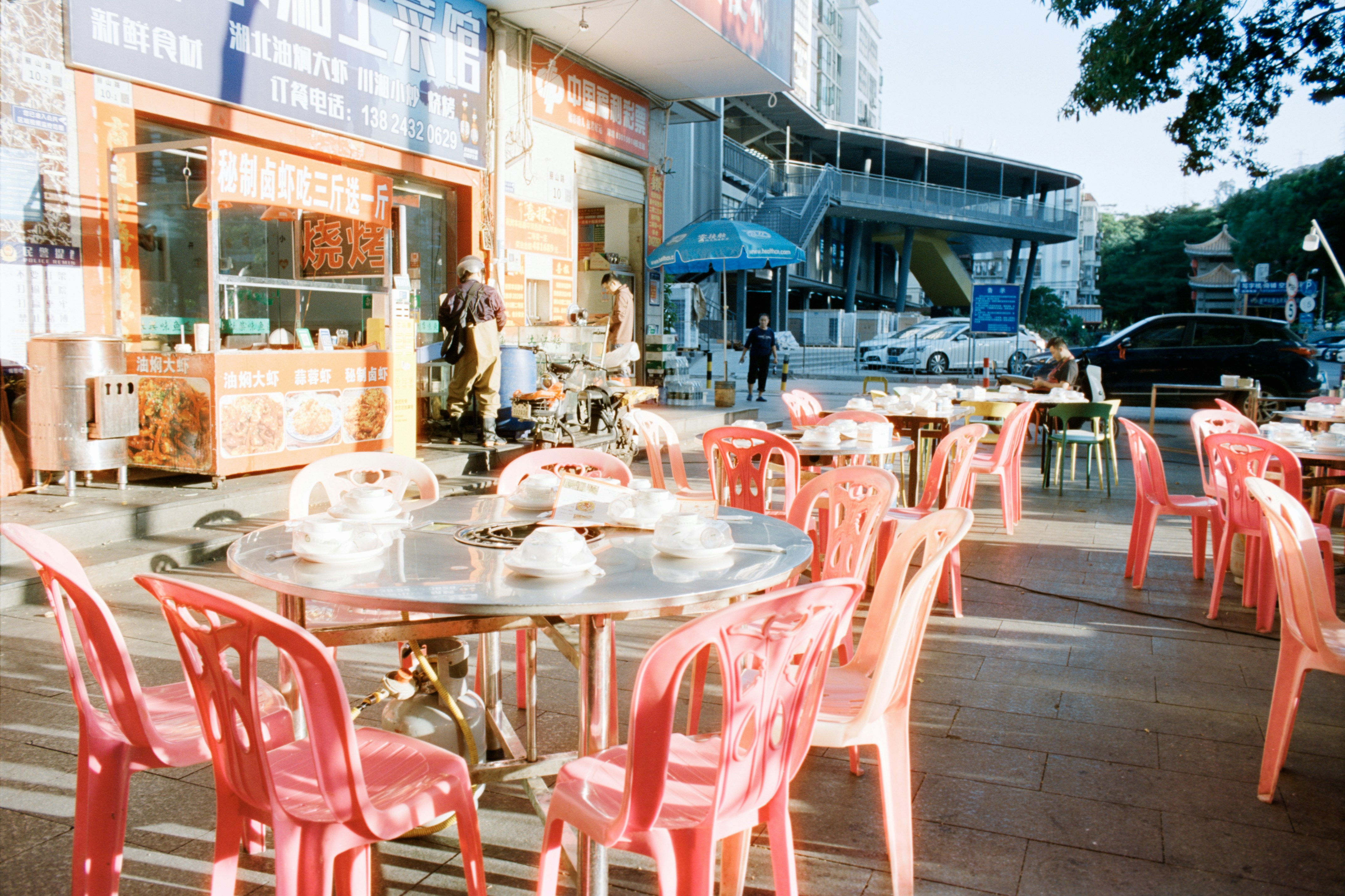 busy River North street with outdoor dining patios - One Bedroom Apartments River North