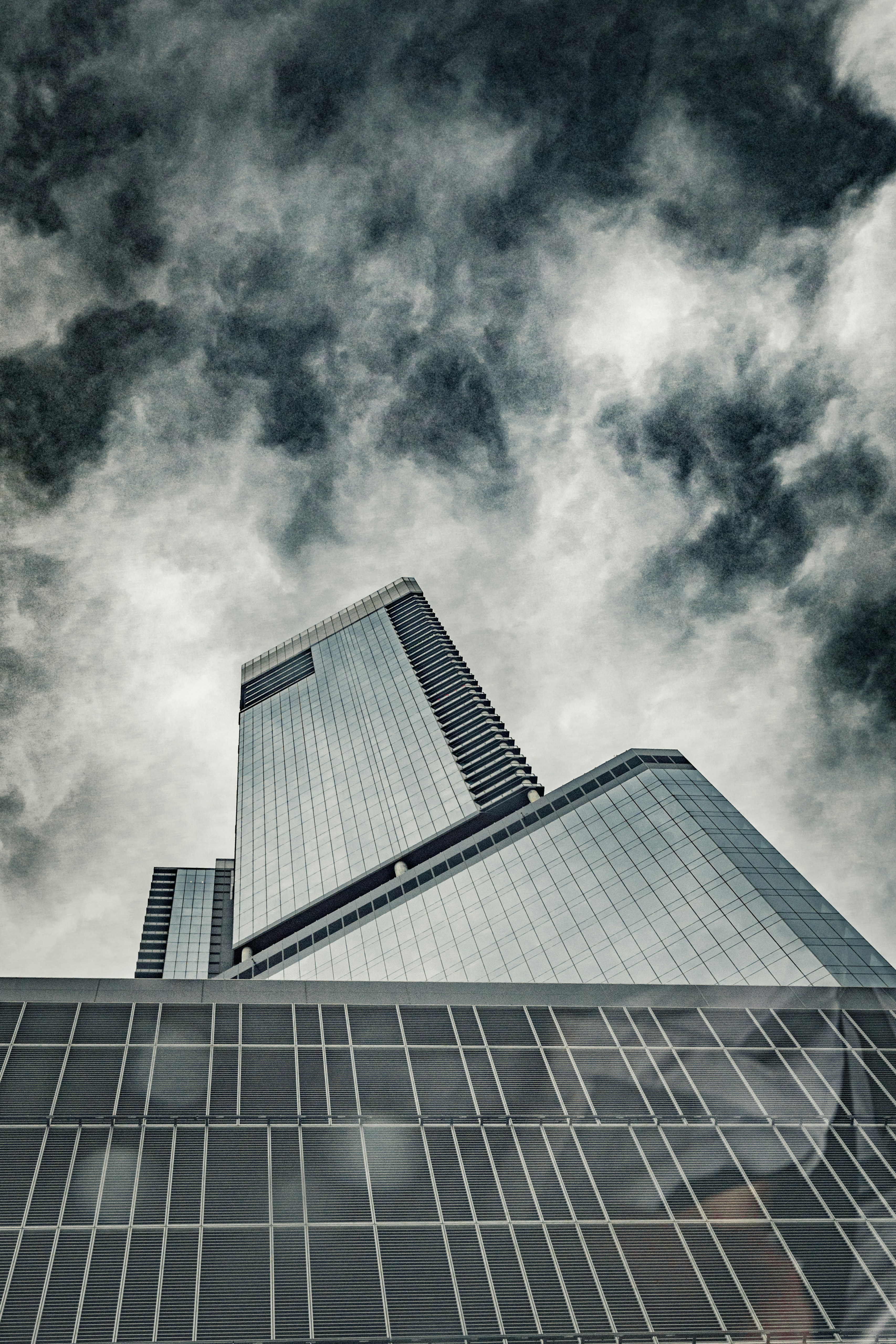 Modern skyscrapers against a cloudy sky