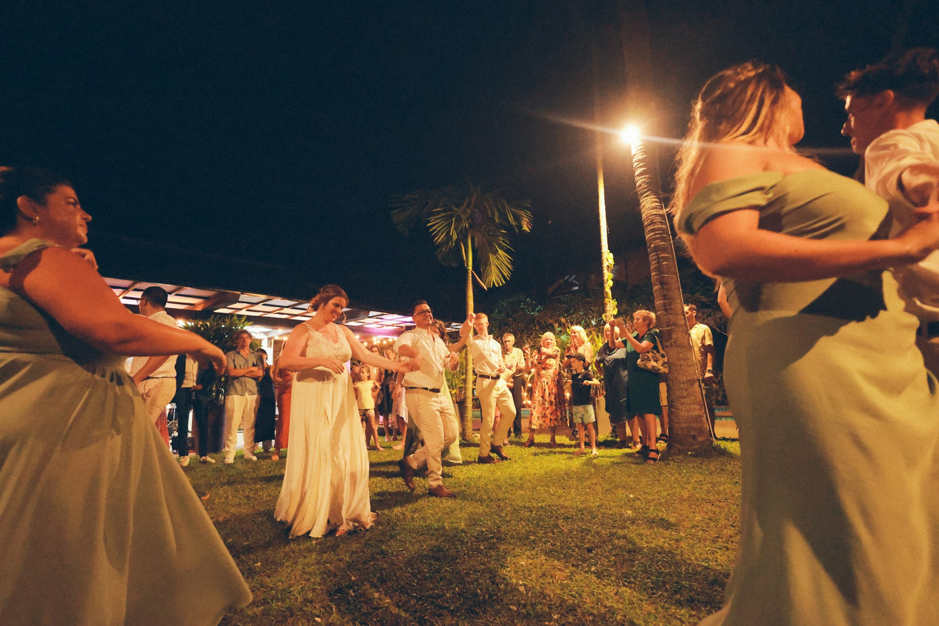 People dancing at an outdoor night event