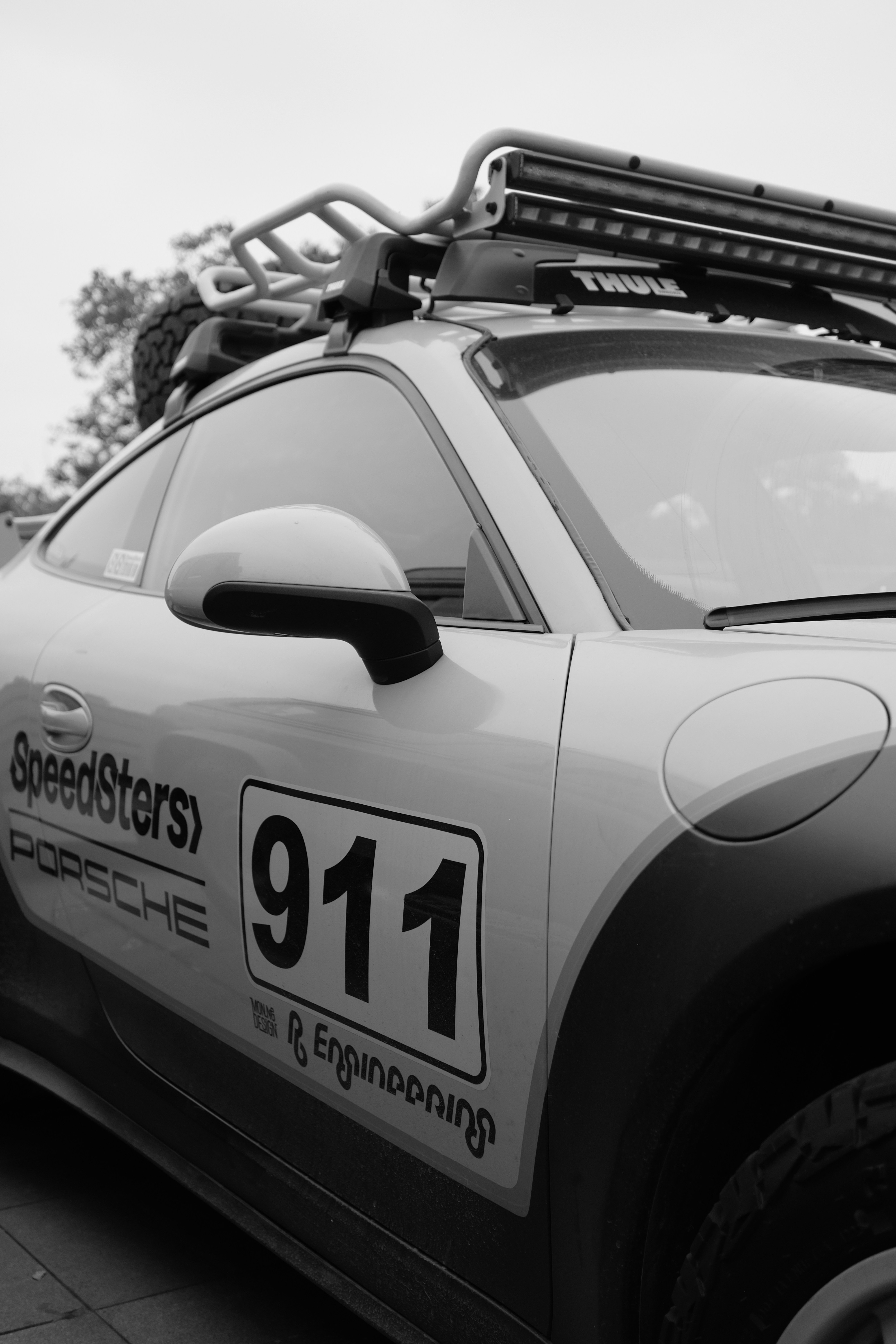 Modified porsche 911 with roof rack and lights