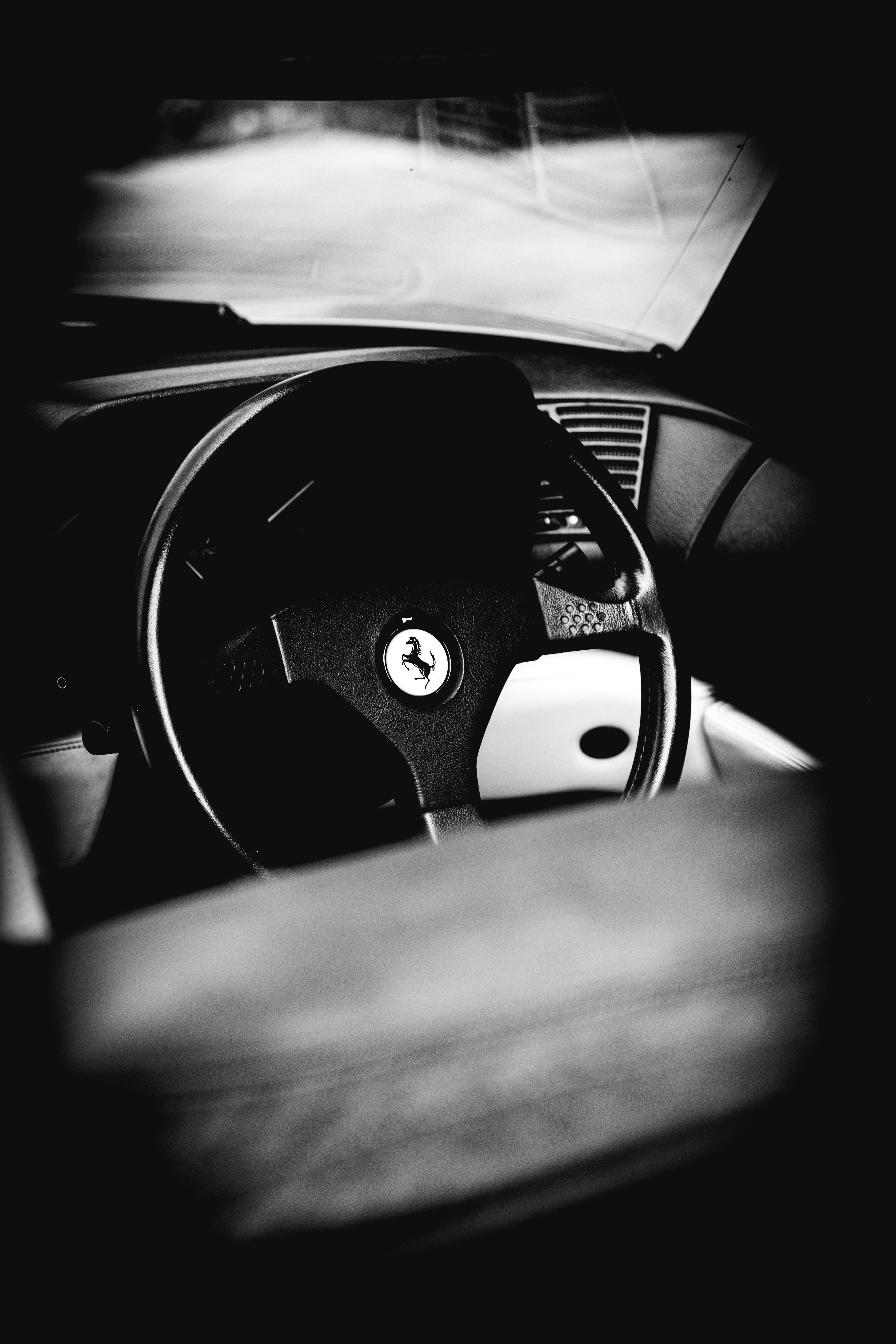 Interior view of a classic ferrari steering wheel