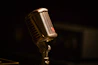 Vintage microphone on a dark background