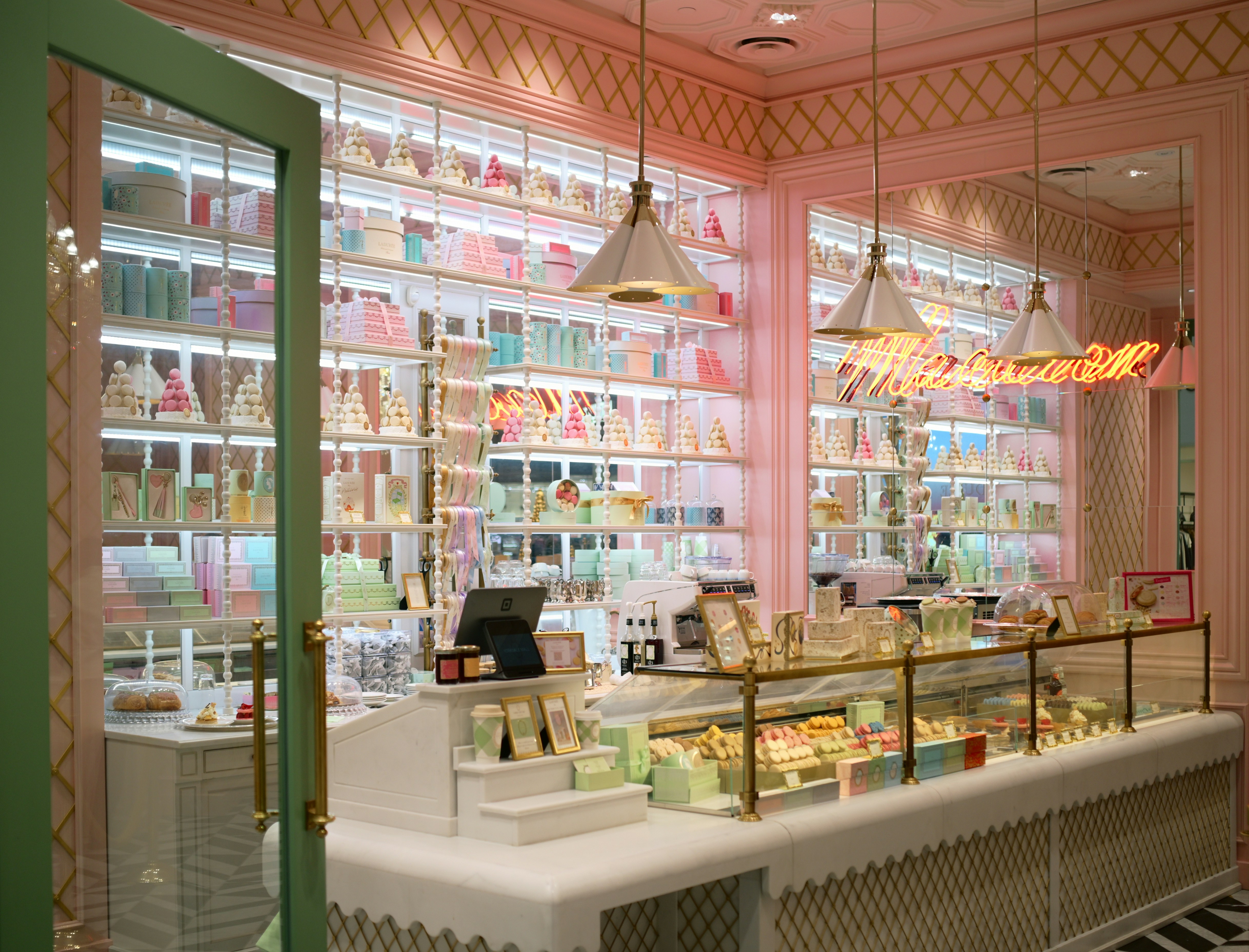 Pastel-colored shop interior with shelves of goods
