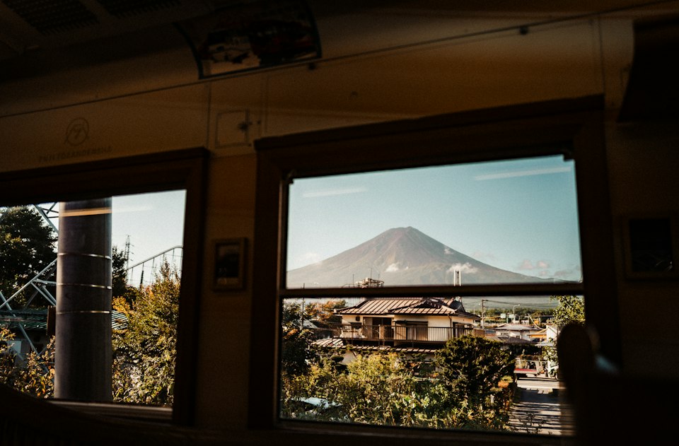 Mount Fuji seen through a train window on the Romancecar ride back toward Tokyo