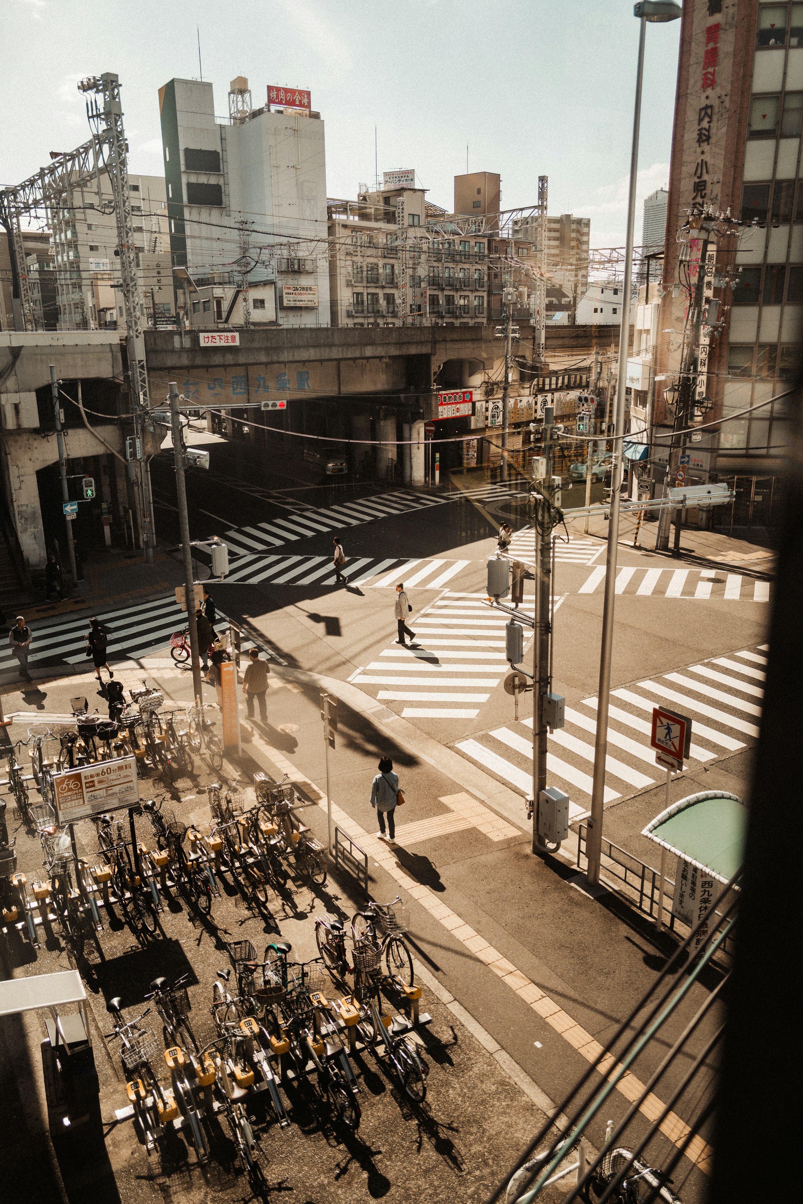 City street with crosswalks and parked bicycles