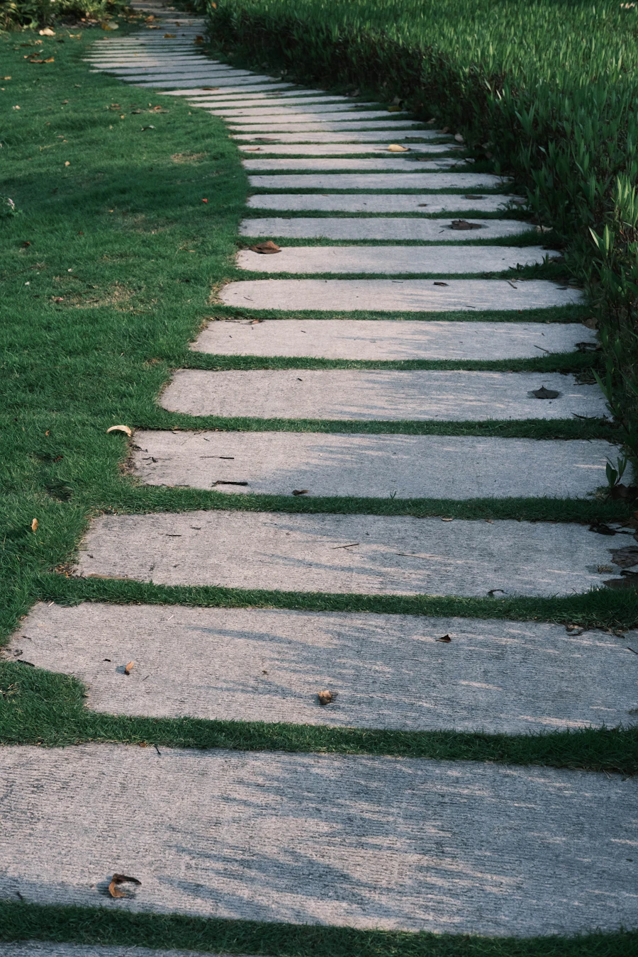 A stepping-stone walkway installed through the lawn