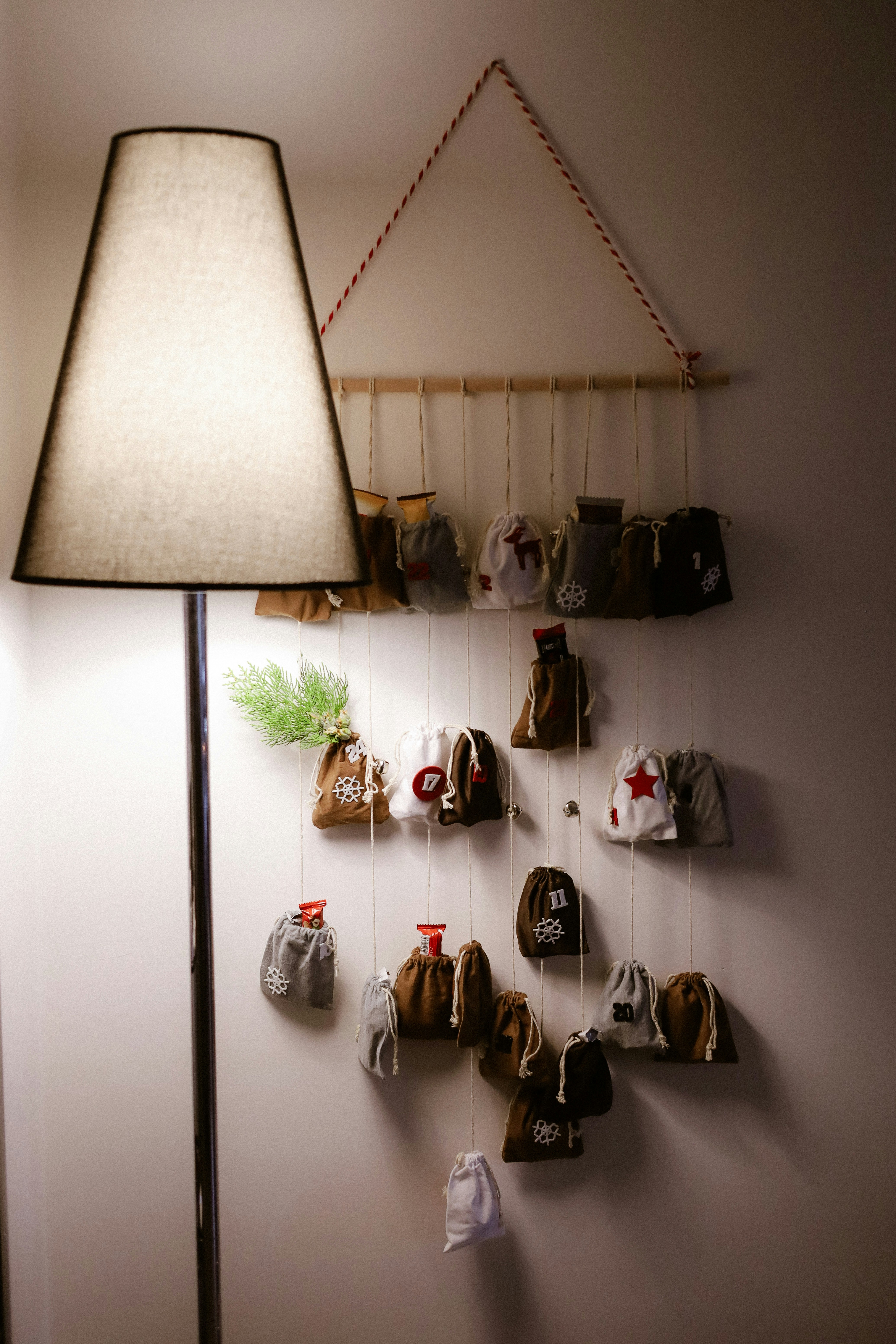 Hanging advent calendar with small fabric bags