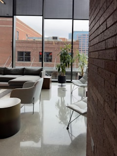 Modern lounge area with large windows and city view