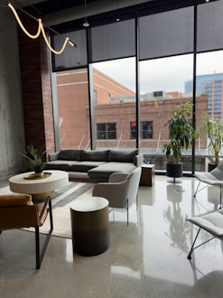 Modern living room with large windows and city view
