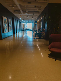 Modern hallway with seating areas and artwork